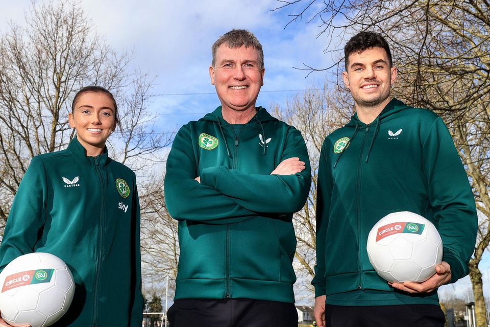 Ireland manager Stephen Kenny, centre, with John Egan and Abbie Larkin at the launch of Circle K’s new partnership with the FAI. Photo: Dan Sheridan/Inpho