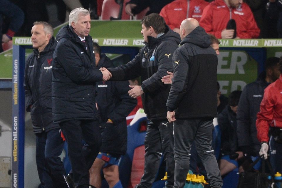 Alan Pardew, pictured second from left, came face to face with his former Newcastle assistant John Carver, second from right