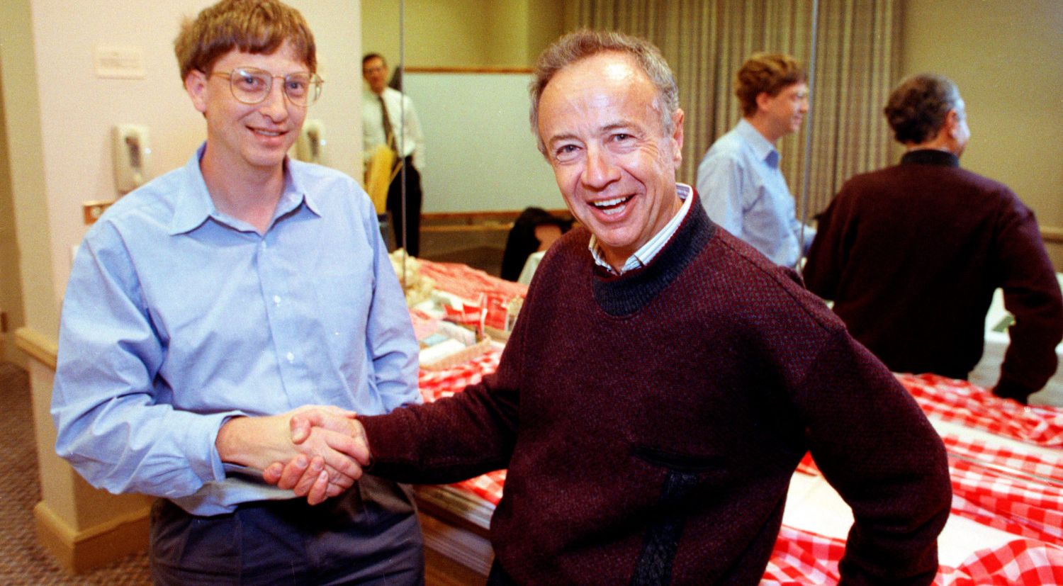 steve jobs and bill gates shaking hands