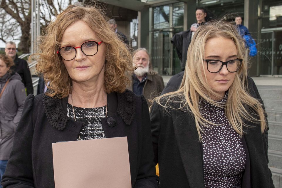 Mary Mullally (left), Patrick’s sister, leaves court with other family members