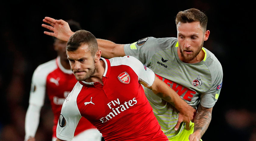 Arsenal's Jack Wilshere in action with FC Koln's Marco Hoger. Photo: David Klein/Reuters