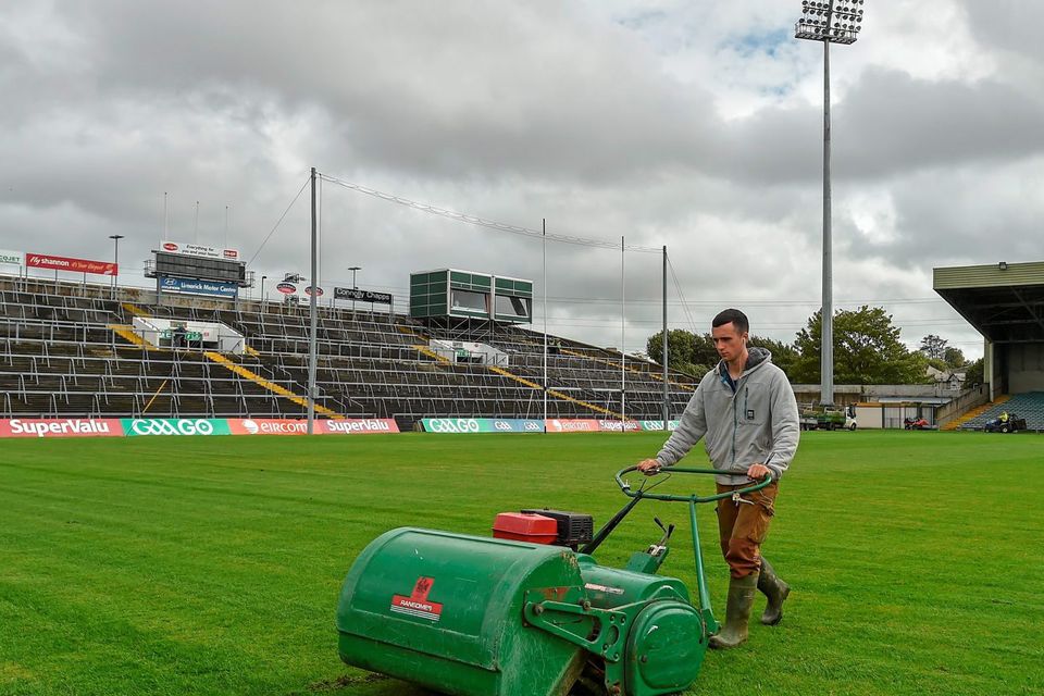 Groundsman Conor Grene, from Ballybricken, Co. Limerick, cuts the grass at the Gaelic Grounds, Limerick, ahead of the Semi-Final replay between Kerry and Mayo