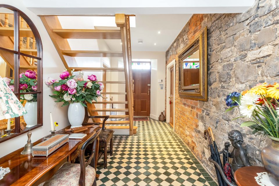 The entrance hallway and stairs