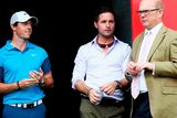 thumbnail: Rory McIlroy of Northern Ireland looks on, with his agent Sean O'Flaherty and Guy Kinnings, global head of golf for IMG after the final day of the Abu Dhabi HSBC Golf Championship at Abu Dhabi Golf Club on January 18, 2015 in Abu Dhabi, United Arab Emirates.  (Photo by Matthew Lewis/Getty Images)