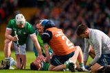 thumbnail: Limerick's Peter Casey is treated to on the pitch after his horror injury. Photo: Sportsfile