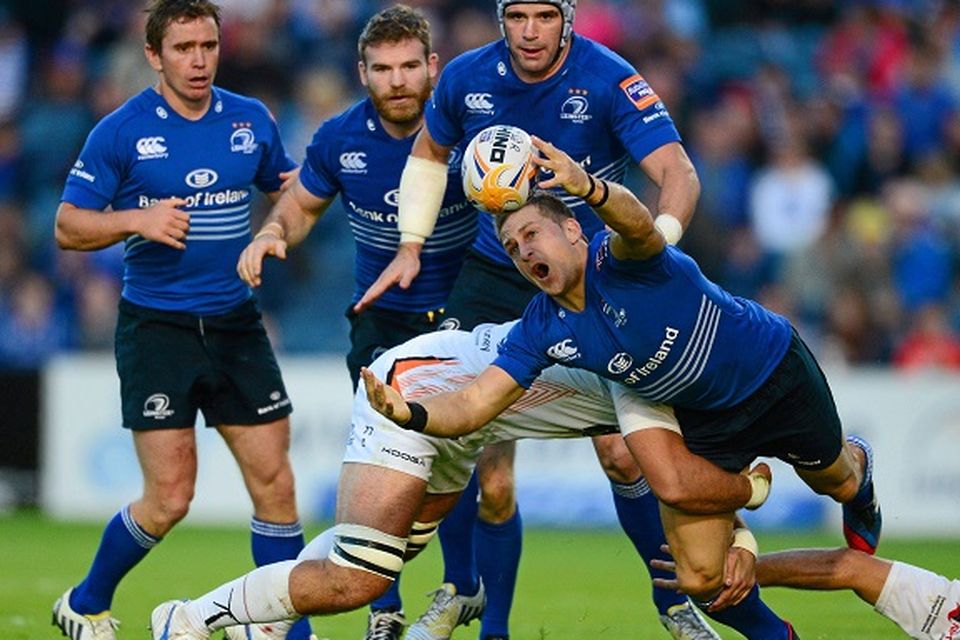 14 September 2013; Jimmy Gopperth, Leinster, is tackled by Tom Smith, left, and Andrew Bishop, Ospreys. Celtic League 2013/14, Round 2, Leinster v Ospreys, RDS, Ballsbridge, Dublin. Picture credit: Paul Mohan / SPORTSFILE