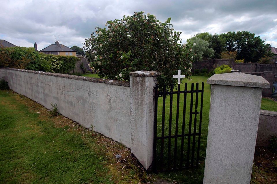 The entrance to the site of a mass grave of hundreds of children who died in the former Bons Secours home for unmarried mothers is seen in Tuam, County Galway. Photo: Reuters