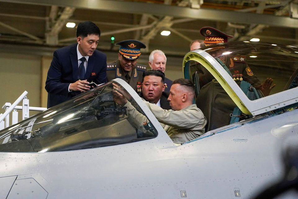 North Korean leader Kim Jong Un looks at a military jet cockpit while visiting a Russian aircraft plant in the eastern city of Komsomolsk-on-Amur. Photo: AP