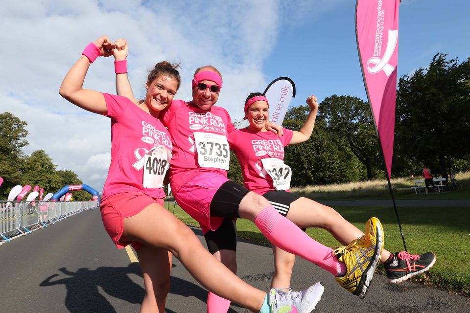 Pictured are (LtoR) Johanna Schaule, Steve Johnson and Christina Feilen with other thousands of men, women and children taking part in the 5th Great Pink Run.  Photography: Sasko Lazarov/ Photocall Ireland