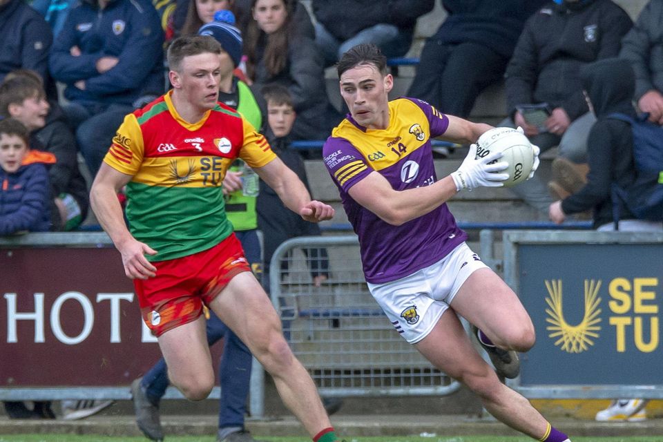 Wexford full-forward Robbie Brooks taking on Carlow’s Mikey Bambrick.