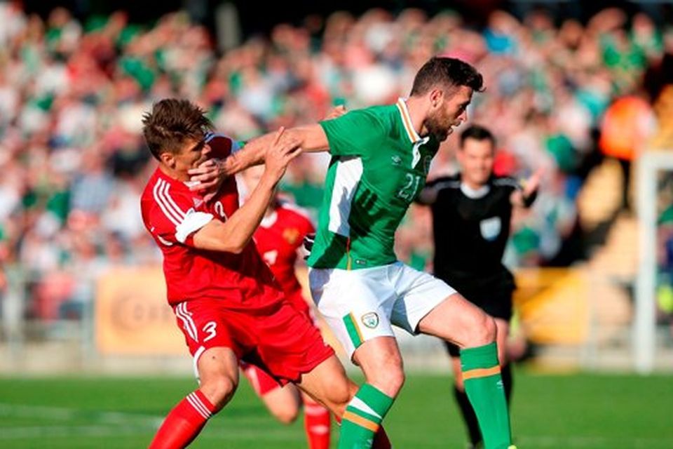 Republic of Ireland's Daryl Murphy (right) and Belarus' Alyaksandr Martynovich battle for the ball during the International Friendly match at the Aviva Stadium, Dublin