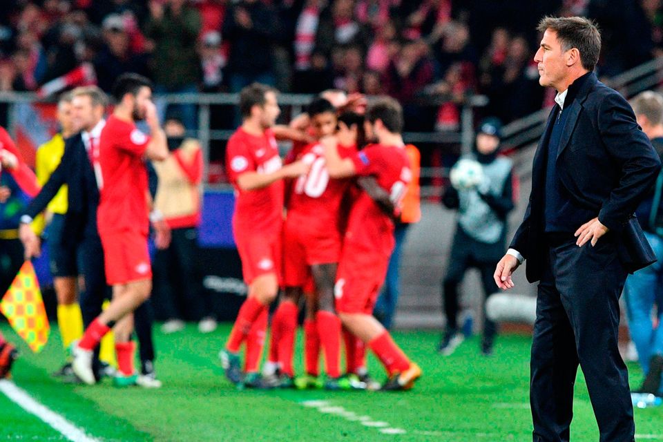 Sevilla's coach from Argentina Eduardo Berizzo looks on as Spartak Moscow's players celebrate after the UEFA Champions League Group E football match between FC Spartak Moscow and Sevilla FC at the Otkrytie Arena stadium in Moscow. Photo: Getty
