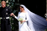 thumbnail: Meghan’s flower-embroidered veil. Photo: PA