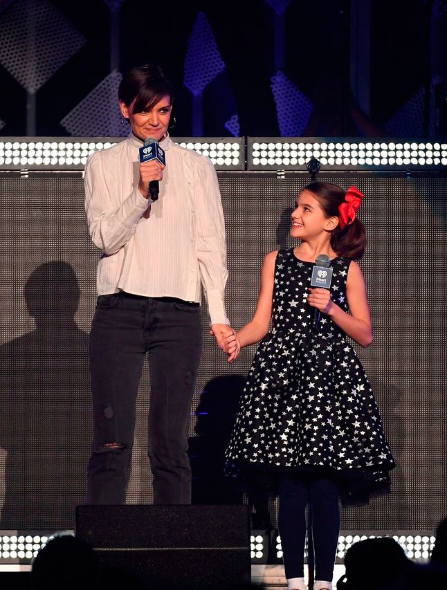 Suri Cruise Looks Just Like Mum Katie Holmes As They Introduce Taylor Swift On Stage At Jingle 