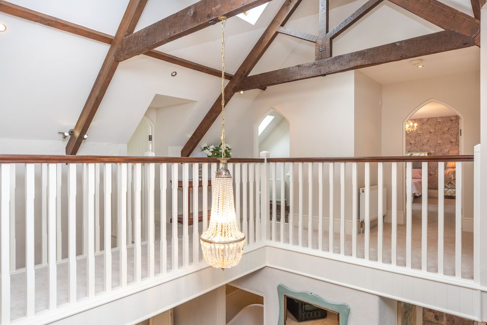 The landing and exposed ceiling beams
