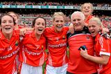 thumbnail: 28 September 2014; Cork manager Eamon Ryan with players, from left to right, Grace Kearney, Geraldine O'Flynn, Angela Walsh, Valerie Mulcahy and Deirdre O'Reilly after the game. TG4 All-Ireland Ladies Football Senior Championship Final, Cork v Dublin. Croke Park, Dublin. Picture credit: Brendan Moran / SPORTSFILE