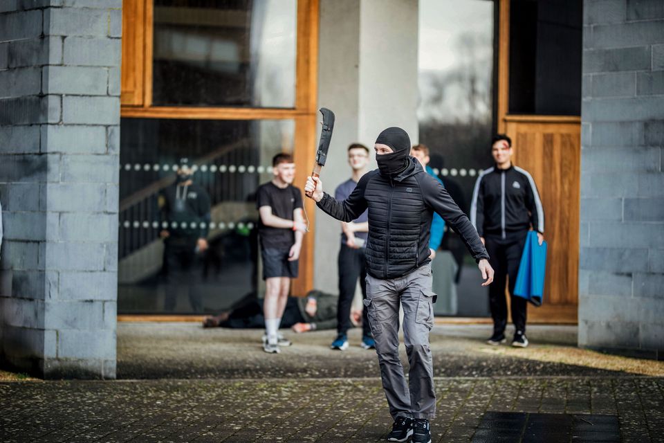 A man wielding a machete at the largest ever immersive simulation thrusts students into emergency situation at University of Limerick. Photo: Brian Arthur