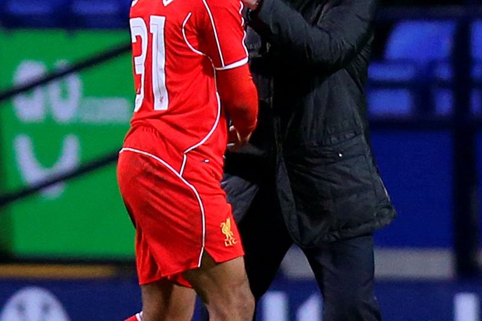 Raheem Sterling, who has been in the eye of a storm this week following the revelation that he wants to leave Liverpool, shakes hands with manager Brendan Rodgers on Thursday (Peter Byrne/PA Wire)