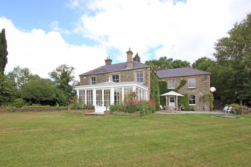 The Mill House at Kilcullen is a 19th-century stone house that has been extended and modernised.