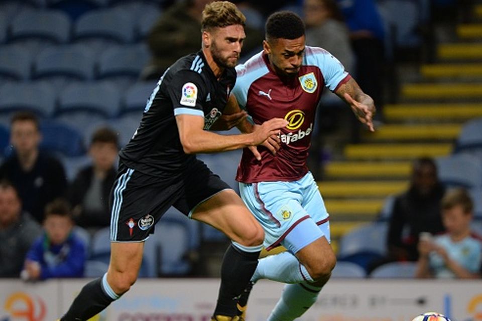 BURNLEY, ENGLAND - AUGUST 01:  Andre Gray of Burnley and Sergi Gomez of Celta Vigo in action during the pre-season friendly match between Burnley and Celta Vigo at Turf Moor on August 1, 2017 in Burnley, England. (Photo by Nathan Stirk/Getty Images)