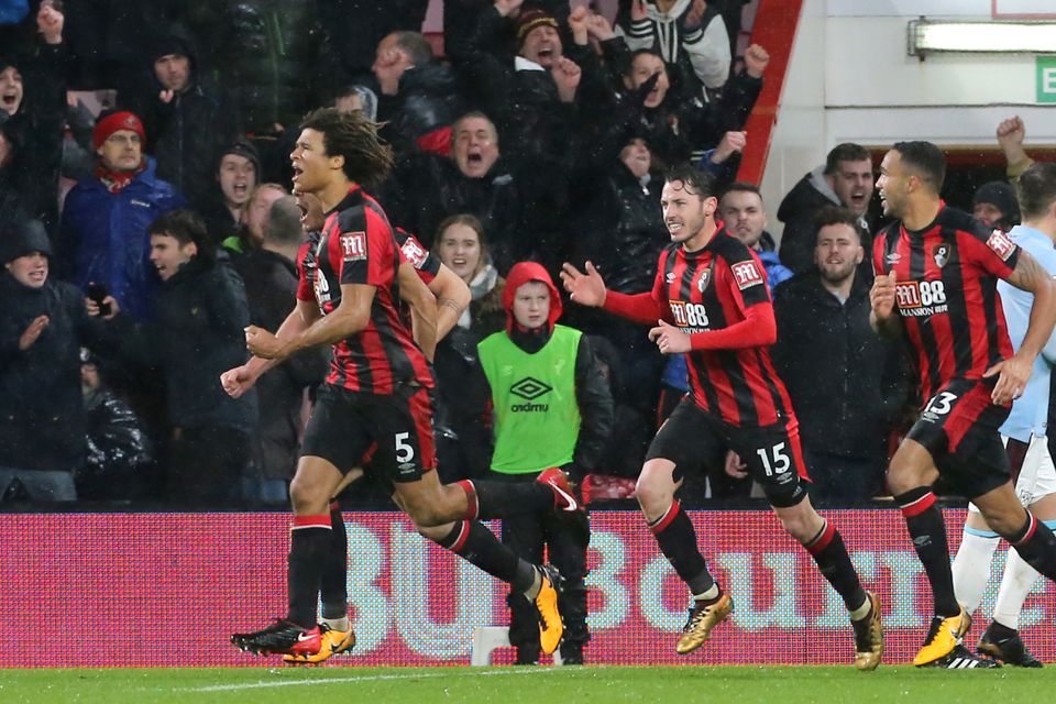 Bournemouth players celebrate their late equaliser against West Ham