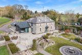 thumbnail: An aerial view of the exterior and grounds