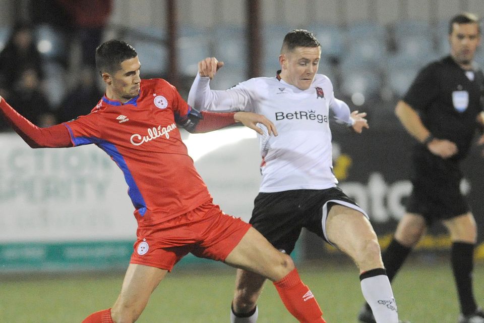 Dundalk's Cameron Elliott is challenged by Shane Griffin, Shelbourne, during the Leinster Senior Cup game in Oriel Park. Picture: Aidan Dullaghan/Newspics