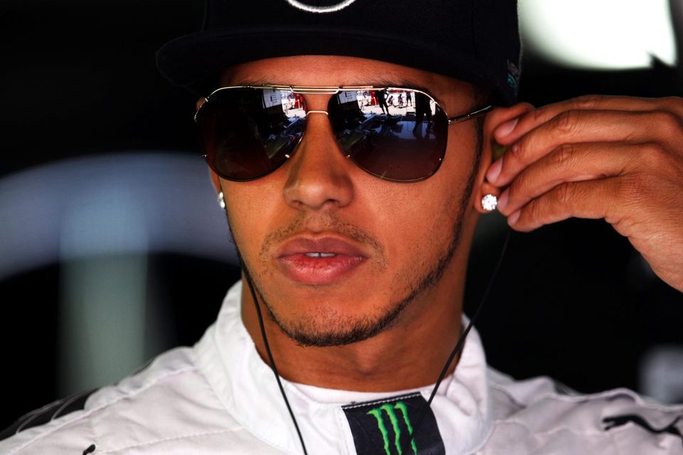 Mercedes driver Lewis Hamilton looks on in the garage during practice ahead of the German Grand Prix at Hockenheim. Photo: Drew Gibson/Getty Images