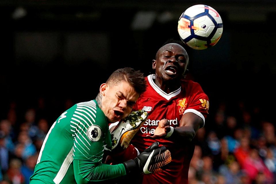 Manchester City’s Ederson Moraes is fouled by Liverpool's Sadio Mane resulting in a red card for Mane