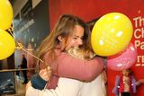 thumbnail: Gemma Kerrigan from Mullingar hugs her friend Rebecca Doolin, after she returned home from New York for Christmas. Picture: Frank McGrath