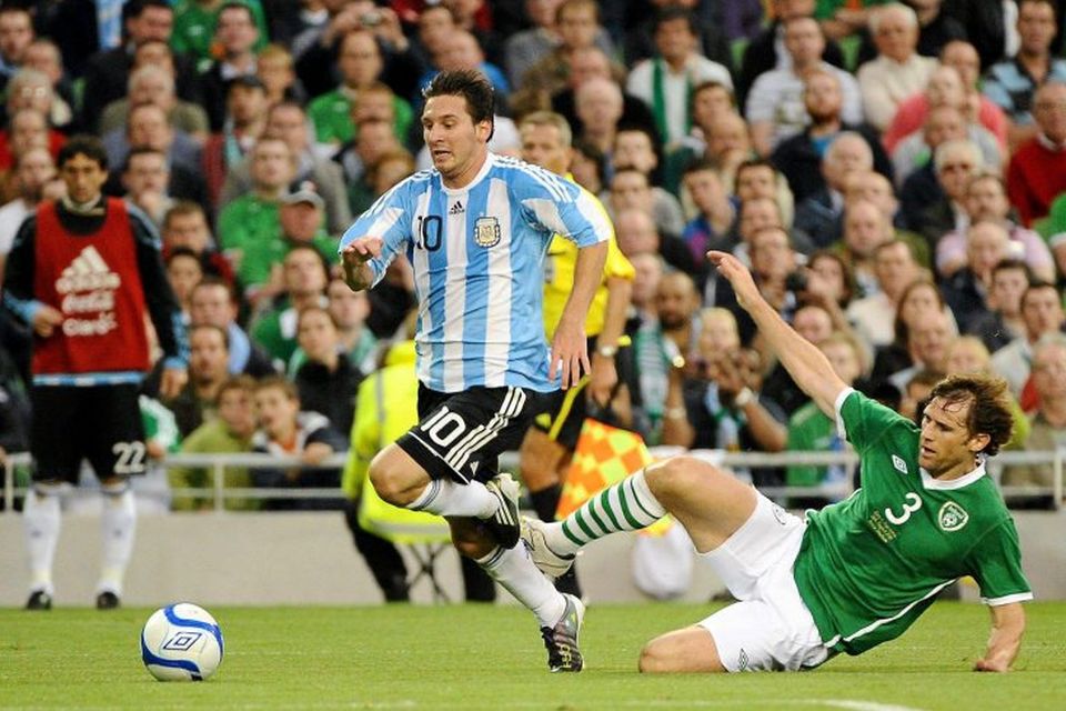 Lionel Messi, Argentina, in action against Kevin Kilbane, Republic of Ireland in 2010