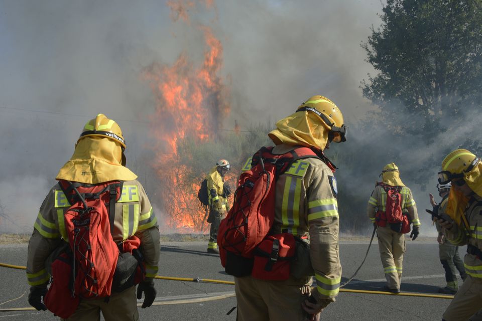 Fiirefighters tackle a wildfire last August in San Cristovo de Cea, Ourense, Galicia, Spain. Photo: Rosa Veiga via Getty Images