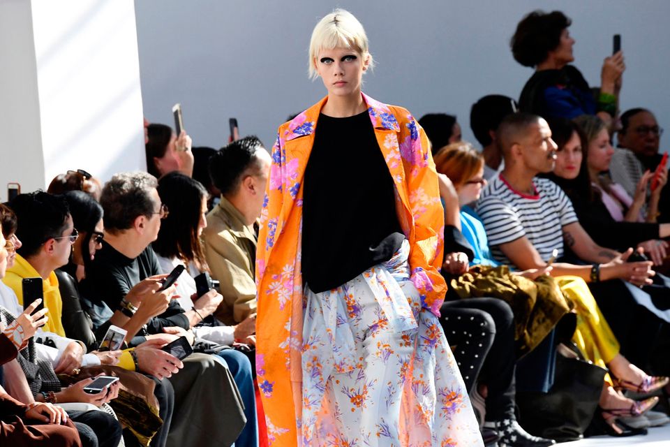 A model presents a creation by Dries Van Noten during the Spring-Summer 2019 Ready-to-Wear collection fashion show in Paris, on September 26, 2018. (Photo by Anne-Christine POUJOULAT / AFP)