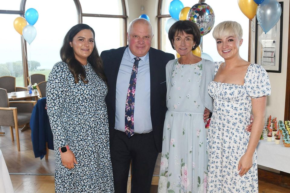 Declan McCarthy pictured with his wife Patricia and daughters Orla and Katie at his retirement party at Wicklow Golf Club.