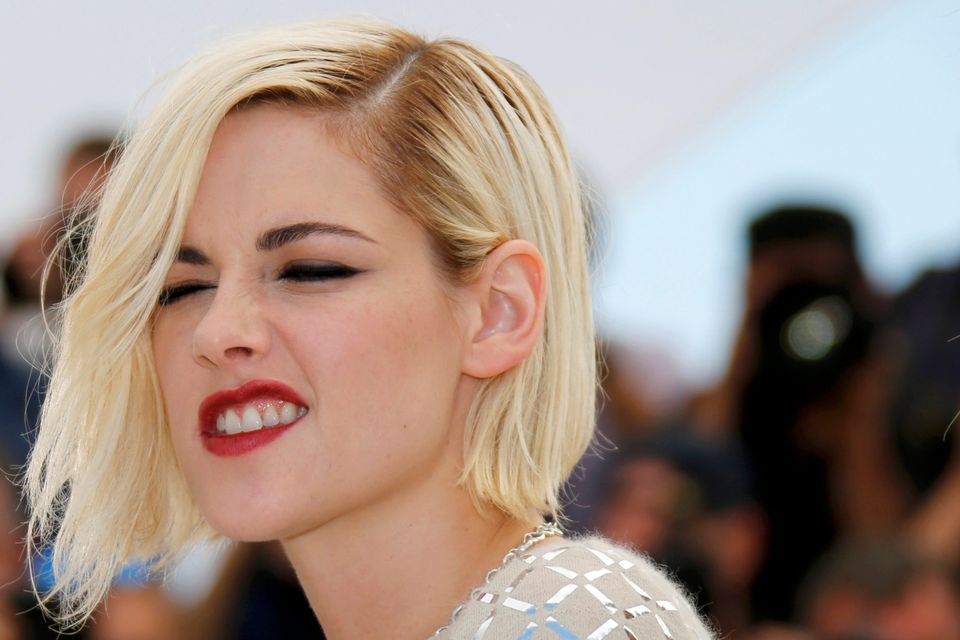 Out of favour: Kristen Stewart rubbed the Cannes crowd up the wrong way as she walked the red carpet.