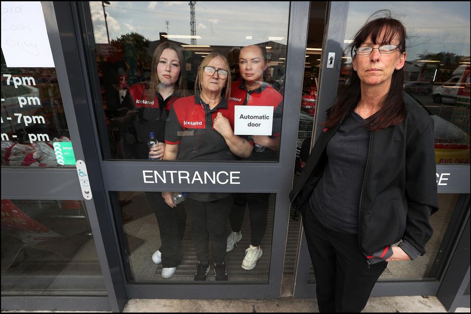 Donna Cassells, who is manager at Iceland in Coolock, outside the store where three staff members, Molly Prendergast, Karen Keating and Jeanette-Joyce Flood remain on a sit-in protest inside the store. (Photo by Steve Humphreys)