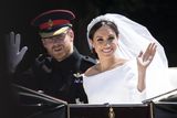 thumbnail: Prince Harry, Duke of Sussex and Meghan, Duchess of Sussex travel in the Ascot Landau Carriage during their carriage procession after their wedding on May 19, 2018 in Windsor, England