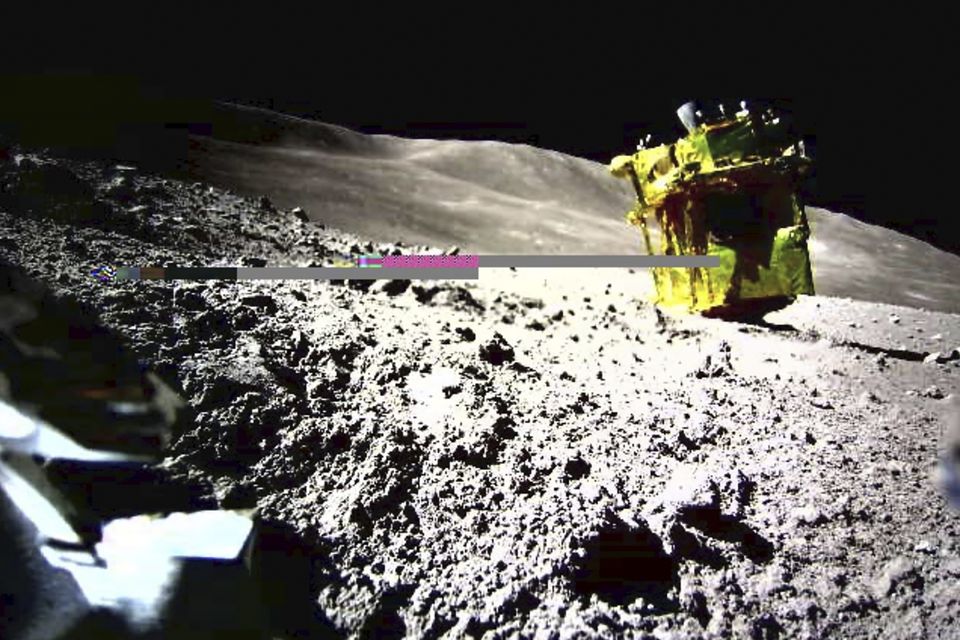 This image provided by the Japan Aerospace Exploration Agency shows an image taken by a Lunar Excursion Vehicle 2 (LEV-2) of a robotic moon rover called SLIM on the moon (JAXA/Takara Tomy/Sony Group Corporation/Doshisha University via AP)