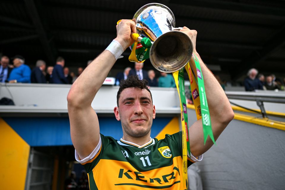 Kerry captain Paudie Clifford lifts the cup after the Munster GAA Football Senior Championship final match between Kerry and Clare at Cusack Park in Ennis, Clare. Photo by Brendan Moran/Sportsfile