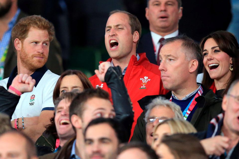 Prince Harry (left), The Duke of Cambridge (centre) and The Duchess of Cambridge before the Rugby World Cup match at Twickenham Stadium, London.