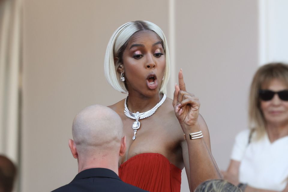 Kelly Rowland shouting at a security guard on the red carpet at the Cannes Film Festival