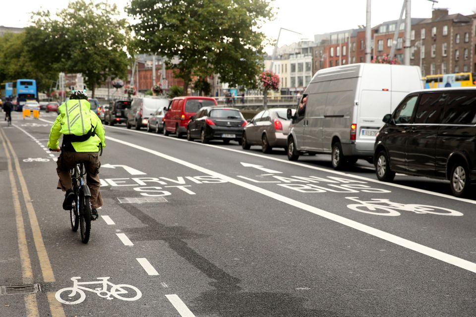 Broken white lines cycle lane outlet
