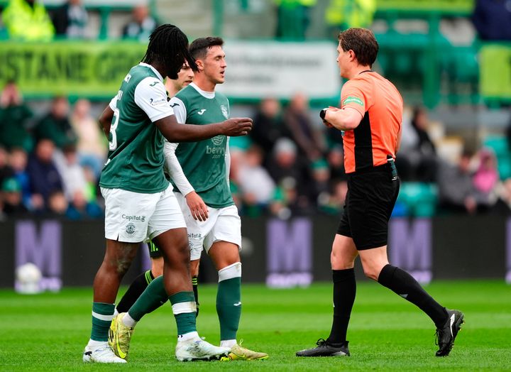 Jamie McGrath sent off as Celtic edge Hibernian to close gap on leaders Hearts