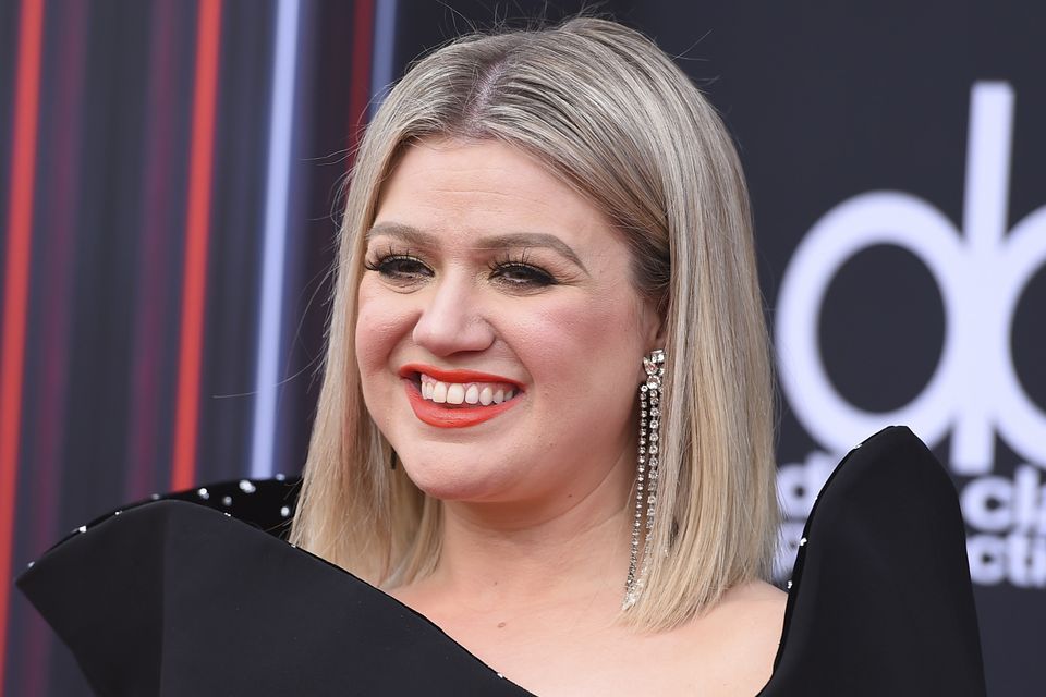 Host of the 2018 Billboard Music Awards Kelly Clarkson opened the ceremony with a call for a "moment of change" after 10 people were killed at a school shooting in Texas (Jordan Strauss/Invision/AP)