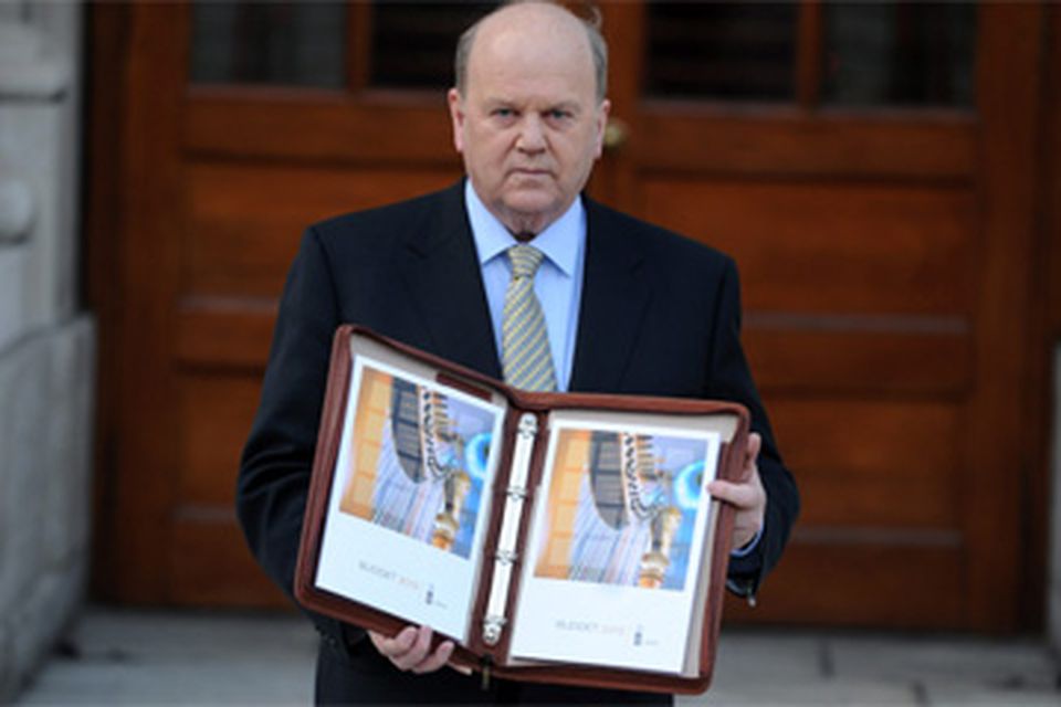 Finance Minister
Michael Noonan
presenting the
budget for 2012
in December