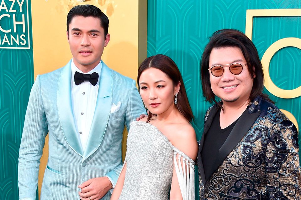 Henry Golding, Constance Wu and Kevin Kwan attend the premiere of Warner Bros. Pictures' "Crazy Rich Asiaans" at TCL Chinese Theatre IMAX on August 7, 2018 in Hollywood, California.  (Photo by Alberto E. Rodriguez/Getty Images)
