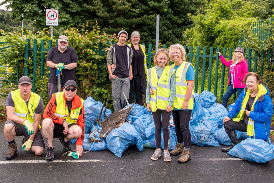 The group with rubbish they collected at Ballywaltrim playing fields