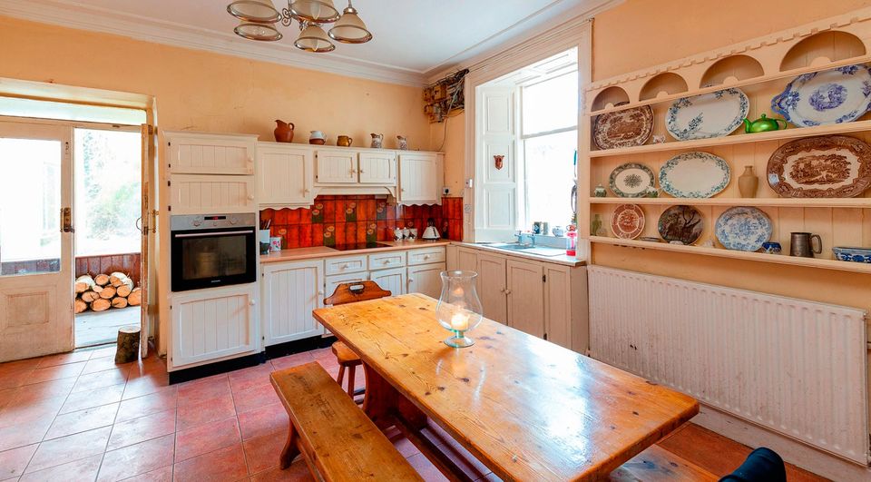 The kitchen can be accessed from the garden room or the hallway and is to the rear of  the house.