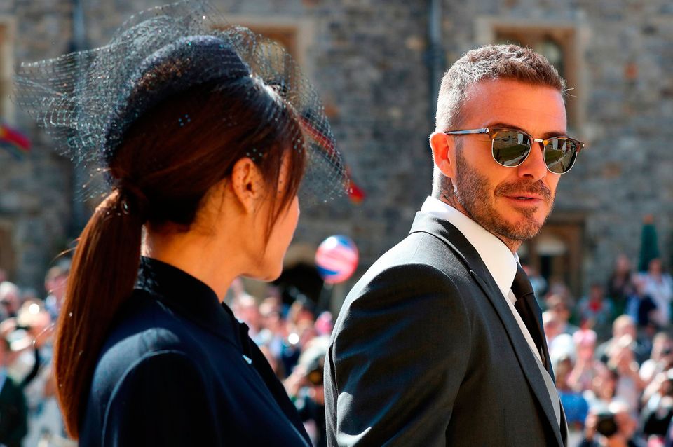 David Beckham and Victoria Beckham arrive at St George's Chapel at Windsor Castle for the wedding of Meghan Markle and Prince Harry. PRESS ASSOCIATION Photo. Picture date: Saturday May 19, 2018. See PA story ROYAL Wedding. Photo credit should read: Gareth Fuller/PA Wire