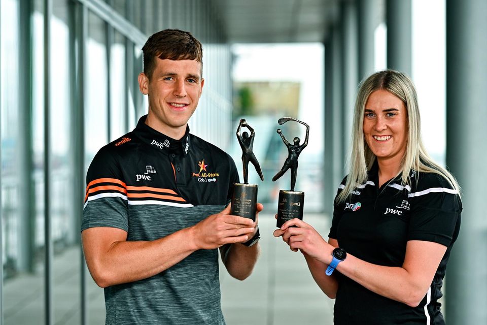 PwC GAA/GPA Player of the Month for May winner, Derry footballer Shane McGuigan, and PwC GPA Women’s Player of the Month for May winner, Down camogie player Dearbhla Magee, receive their awards at PwC offices in Dublin